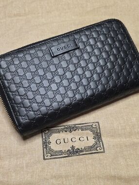 Gucci Black Embossed GG Zip-Around Wallet
